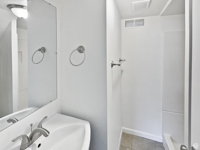 2959 W 1300 N, Clinton, UT 84015 - full bathroom with a sink, tile patterned floors, a shower, and baseboards