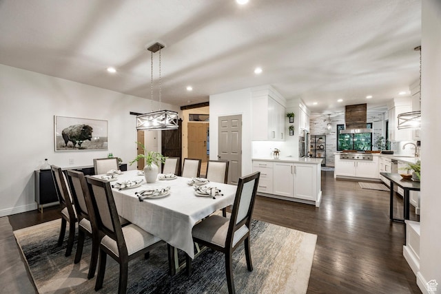 dining space featuring dark wood-style floors and recessed lighting