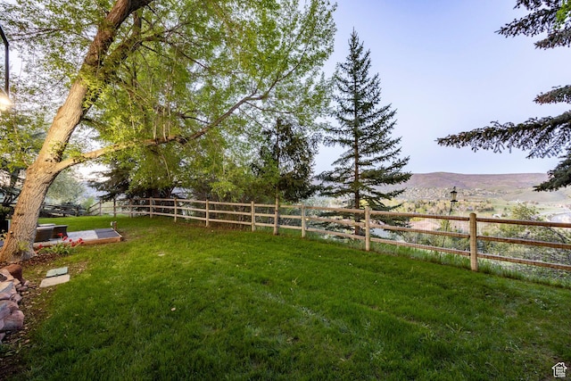 view of yard with a mountain view