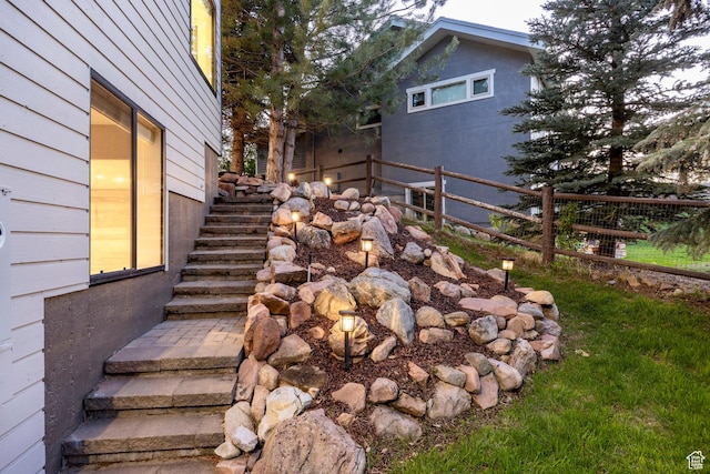 view of home's exterior with stairs