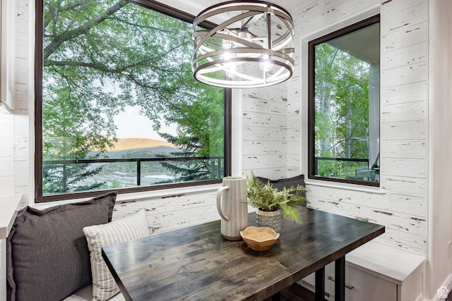 dining area with a chandelier and plenty of natural light