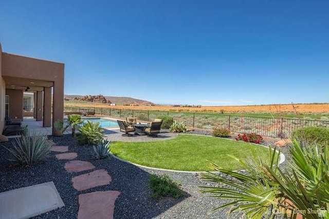 3208 S Sand Stone Dr, Hurricane, UT 84737 - view of yard featuring a patio area and a view of rural / pastoral area