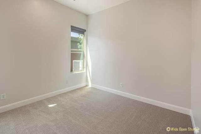 3208 S Sand Stone Dr, Hurricane, UT 84737 - carpeted empty room with baseboards