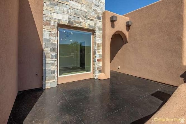 3208 S Sand Stone Dr, Hurricane, UT 84737 - entrance to property with stone siding and stucco siding