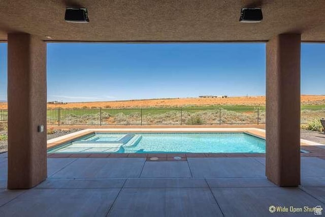 3208 S Sand Stone Dr, Hurricane, UT 84737 - view of swimming pool with a view of countryside, a fenced backyard, and a patio