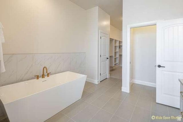 3208 S Sand Stone Dr, Hurricane, UT 84737 - full bathroom with a soaking tub, tile patterned floors, and baseboards