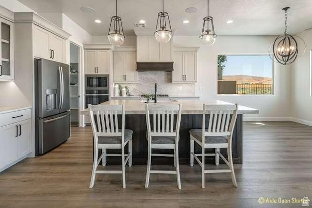 3208 S Sand Stone Dr, Hurricane, UT 84737 - kitchen with stainless steel appliances, recessed lighting, light countertops, tasteful backsplash, and dark wood-type flooring