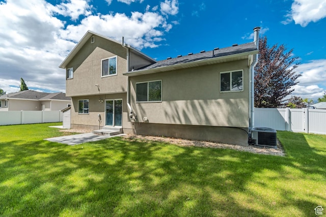 2057 W Marblewood Dr, Riverton, UT 84065 - back of house featuring cooling unit, stucco siding, a patio, and entry steps