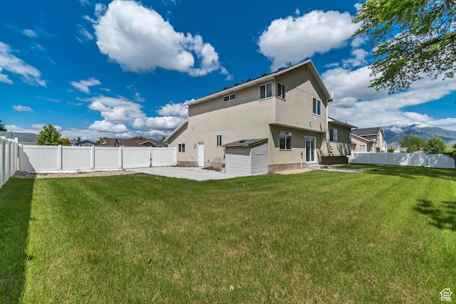 2057 W Marblewood Dr, Riverton, UT 84065 - back of house featuring a patio and stucco siding
