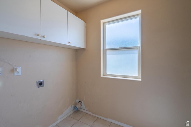 328 Hillcrest Cir, Central, UT 84722 - laundry room with hookup for an electric dryer, cabinet space, light tile patterned flooring, and baseboards