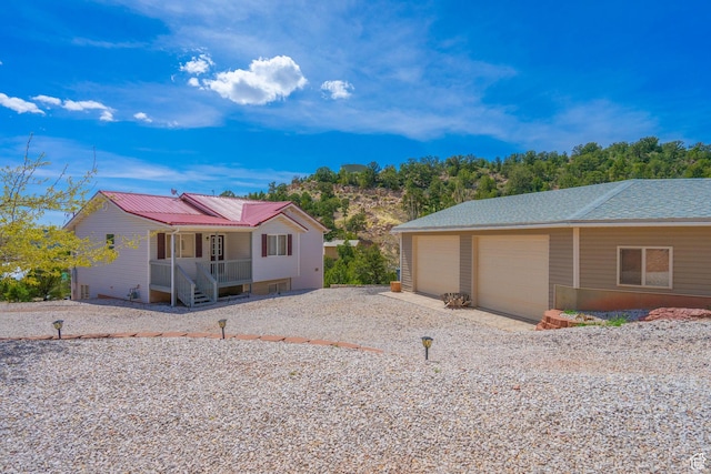 328 Hillcrest Cir, Central, UT 84722 - view of side of home featuring covered porch and a detached garage