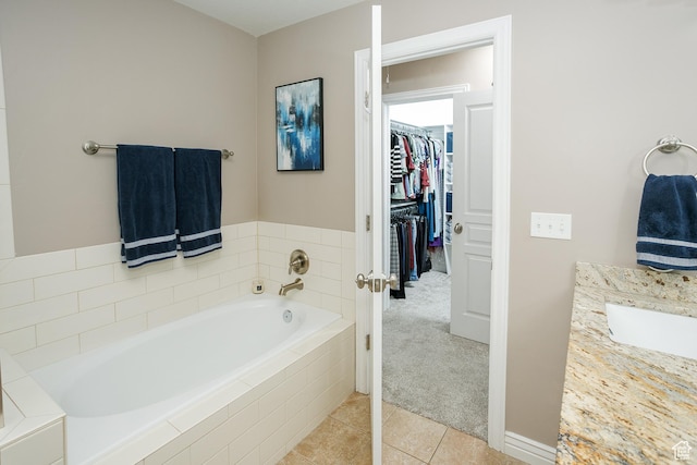 161 S 2775 W, West Point, UT 84015 - bathroom with a spacious closet, a bath, and tile patterned floors