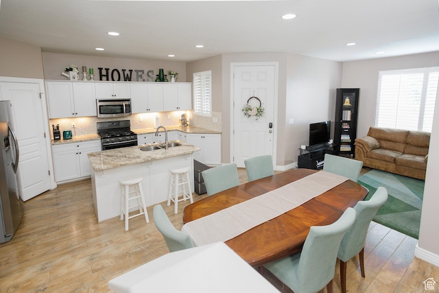 161 S 2775 W, West Point, UT 84015 - dining space featuring recessed lighting and light wood-style flooring