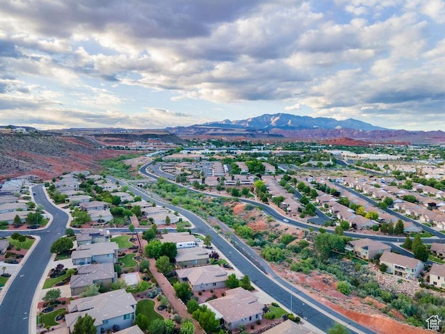 8 S Arroyo Dr, St George, UT 84790 - aerial overview of property's location featuring a mountainous background and nearby suburban area