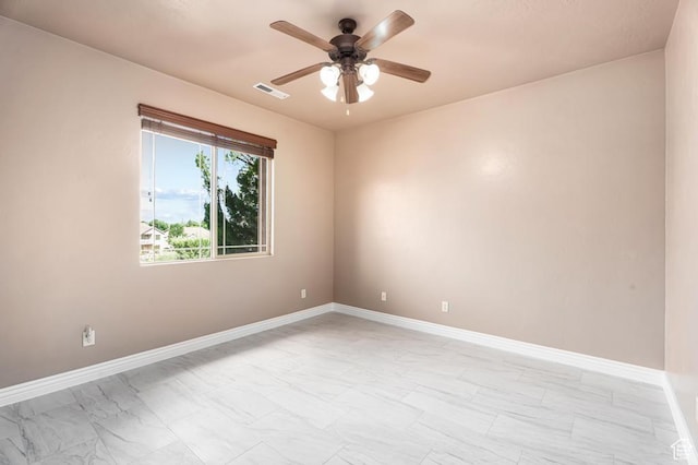 8 S Arroyo Dr, St George, UT 84790 - empty room featuring light marble finish flooring, a ceiling fan, and baseboards