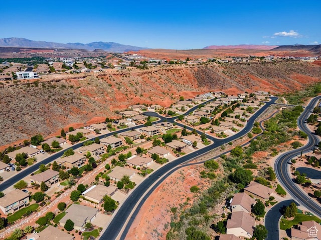 8 S Arroyo Dr, St George, UT 84790 - aerial overview of property's location featuring a mountainous background and nearby suburban area