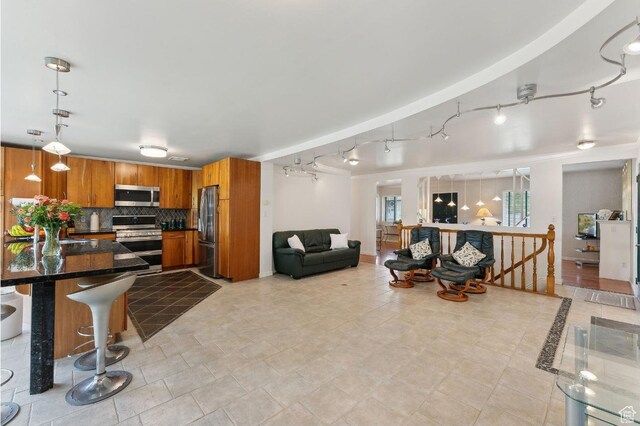 635 E Pioneer Ave S, Sandy, UT 84070 - living room with track lighting