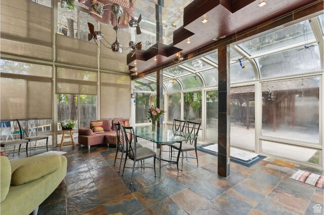 635 E Pioneer Ave S, Sandy, UT 84070 - sunroom / solarium with stone tile flooring and a towering ceiling