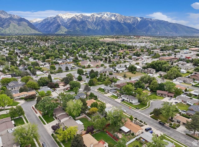 635 E Pioneer Ave S, Sandy, UT 84070 - aerial view of residential area with a mountainous background
