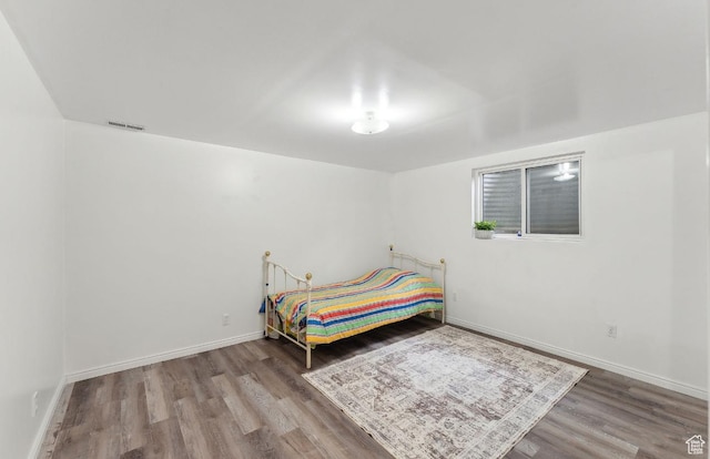 635 E Pioneer Ave S, Sandy, UT 84070 - bedroom with wood finished floors and baseboards