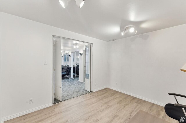 635 E Pioneer Ave S, Sandy, UT 84070 - empty room with wood finished floors and baseboards