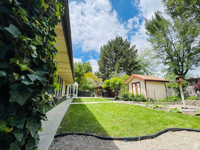 635 E Pioneer Ave S, Sandy, UT 84070 - view of yard featuring an outbuilding
