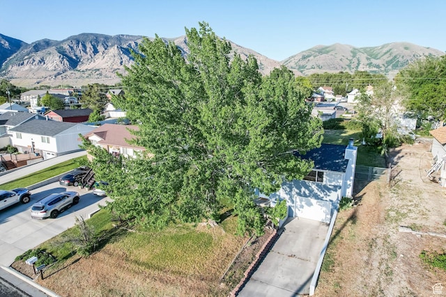 aerial view of residential area with a mountain backdrop