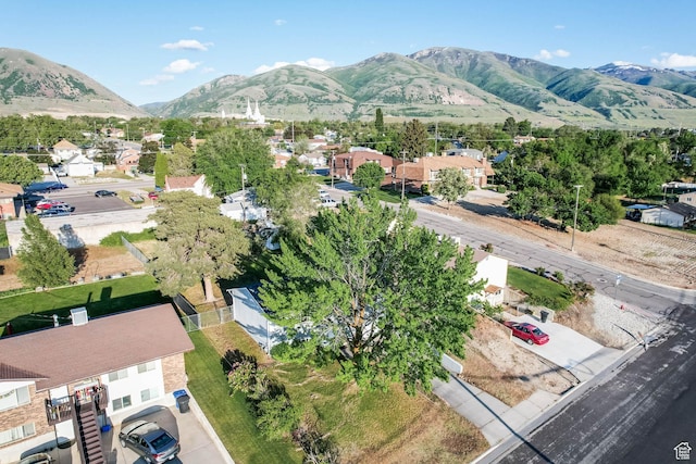 view of mountain background with nearby suburban area