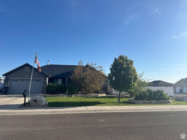 1783 E 2000 S, Naples, UT 84078 - view of front of property with a garage, concrete driveway, and a front lawn