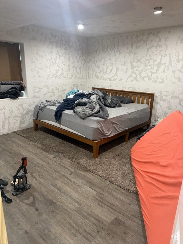 1783 E 2000 S, Naples, UT 84078 - bedroom with wallpapered walls and wood finished floors