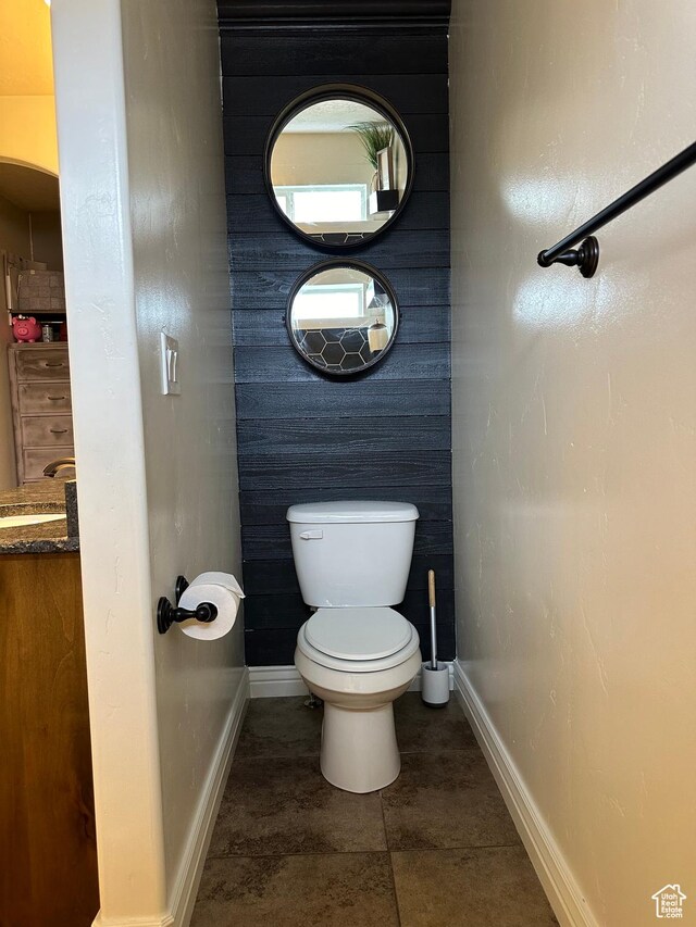 1783 E 2000 S, Naples, UT 84078 - bathroom with baseboards, toilet, and a sink