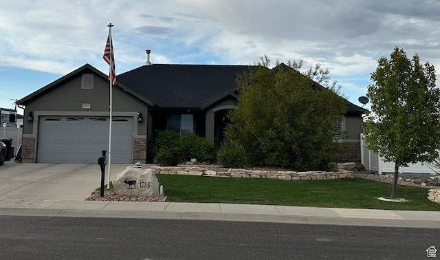 1783 E 2000 S, Naples, UT 84078 - view of front of house with an attached garage, concrete driveway, stone siding, and a front yard
