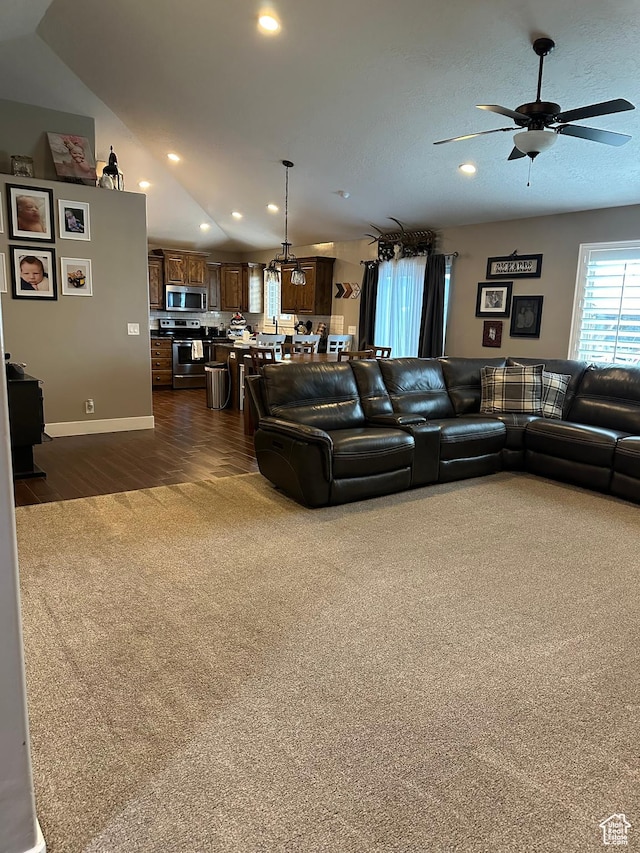 1783 E 2000 S, Naples, UT 84078 - living area featuring ceiling fan, recessed lighting, dark wood finished floors, baseboards, and vaulted ceiling