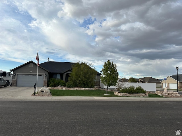 1783 E 2000 S, Naples, UT 84078 - single story home featuring a garage, concrete driveway, and a residential view