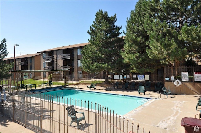 5667 S Aspen Ct E, South Ogden, UT 84403 - community pool with a patio area
