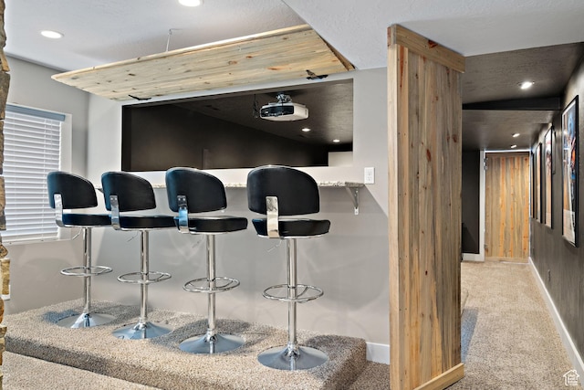 667 W Aspen Hills Blvd N, Saratoga Springs, UT 84045 - bar featuring carpet flooring, baseboards, and recessed lighting