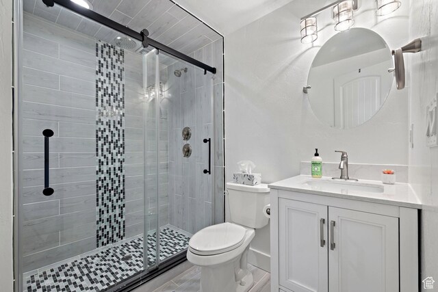 667 W Aspen Hills Blvd N, Saratoga Springs, UT 84045 - full bath featuring toilet, vanity, and a stall shower