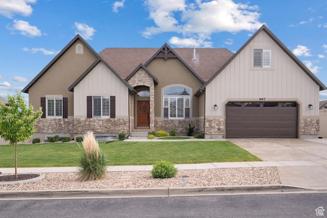 667 W Aspen Hills Blvd N, Saratoga Springs, UT 84045 - view of front facade featuring stone siding, board and batten siding, an attached garage, and a front lawn