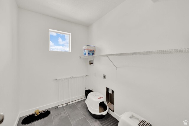 524 E Farmer Alumni Dr S, South Salt Lake, UT 84106 - laundry area featuring hookup for a washing machine, electric dryer hookup, and baseboards