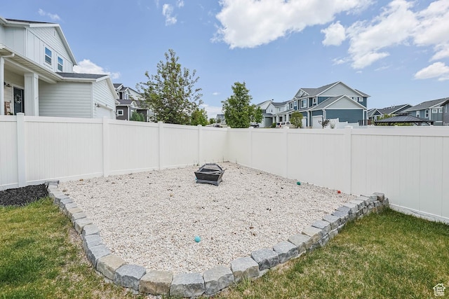 7886 N Bridleway Rd, Eagle Mountain, UT 84005 - view of yard with a residential view and a fire pit