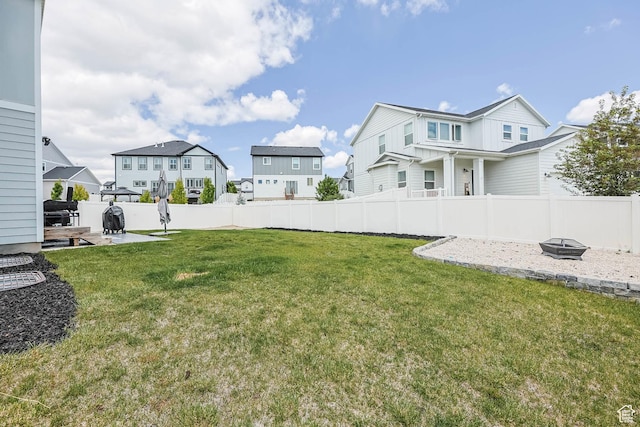7886 N Bridleway Rd, Eagle Mountain, UT 84005 - view of yard with a residential view, a fire pit, and a patio area