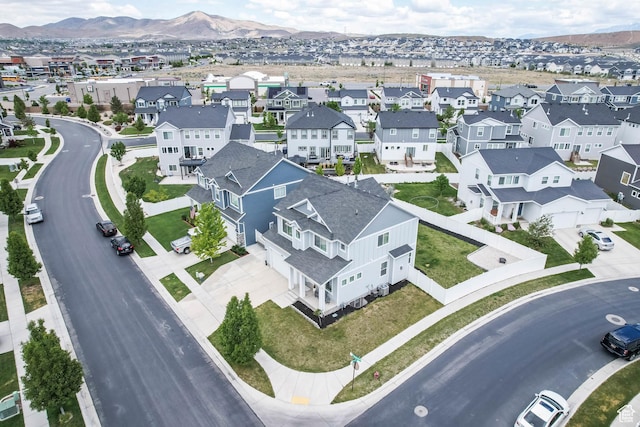 7886 N Bridleway Rd, Eagle Mountain, UT 84005 - aerial view of residential area featuring a mountain backdrop