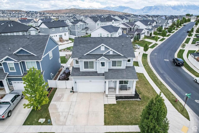 7886 N Bridleway Rd, Eagle Mountain, UT 84005 - aerial view of residential area with mountains