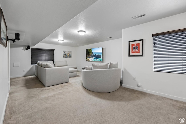 7886 N Bridleway Rd, Eagle Mountain, UT 84005 - home theater room with carpet, baseboards, and a textured ceiling