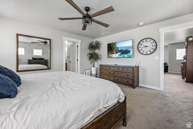 7886 N Bridleway Rd, Eagle Mountain, UT 84005 - bedroom featuring carpet flooring, a textured ceiling, baseboards, and a ceiling fan