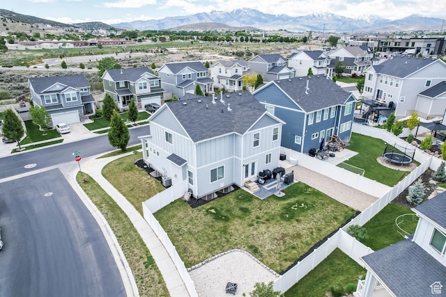 7886 N Bridleway Rd, Eagle Mountain, UT 84005 - aerial view of residential area featuring a mountainous background