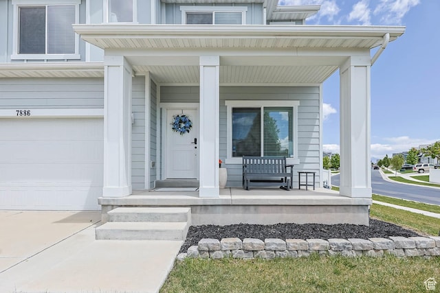 7886 N Bridleway Rd, Eagle Mountain, UT 84005 - entrance to property with a porch and a garage