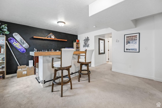 7886 N Bridleway Rd, Eagle Mountain, UT 84005 - bar area featuring carpet, a textured ceiling, and baseboards