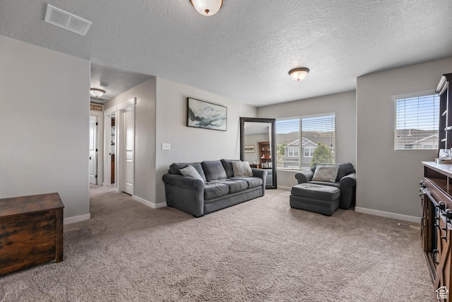 7886 N Bridleway Rd, Eagle Mountain, UT 84005 - carpeted living area with a textured ceiling and baseboards