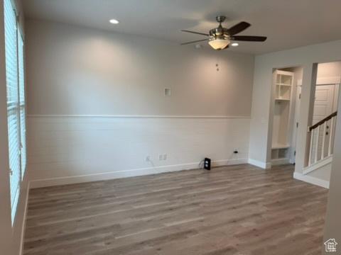 6396 W Sugarcane Dr W Unit 345, South Jordan, UT 84009 - empty room with recessed lighting, wood finished floors, a ceiling fan, stairs, and baseboards